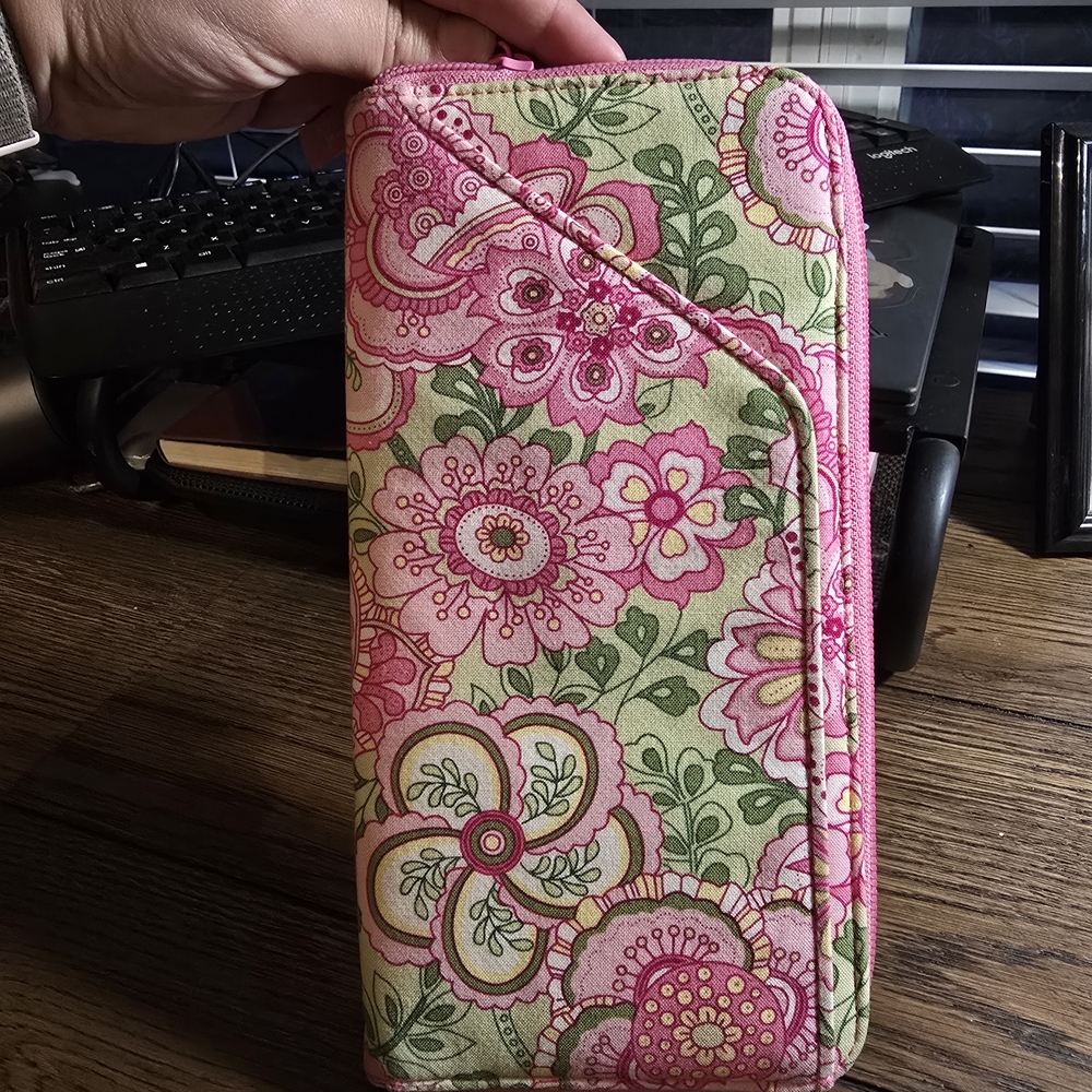 Authentic Vera Bradley zip-around travel wallet in a vibrant floral pink and gre